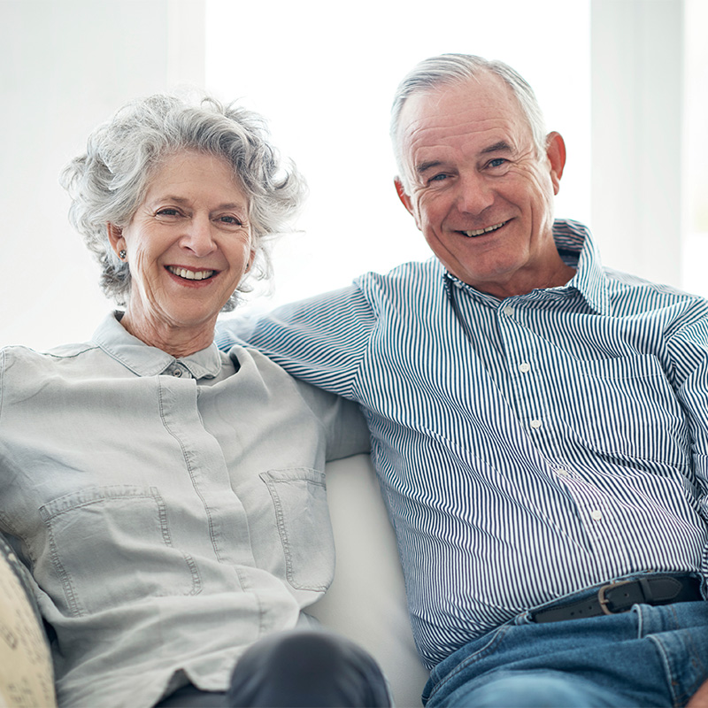 Older couple laughing freely